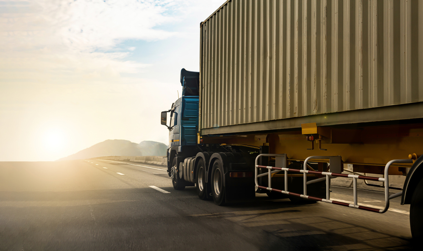 Cargo Truck on Highway Road with Container